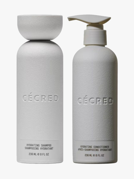 Cécred Hydrating Shampoo and Conditioner in branded components on a light gray background